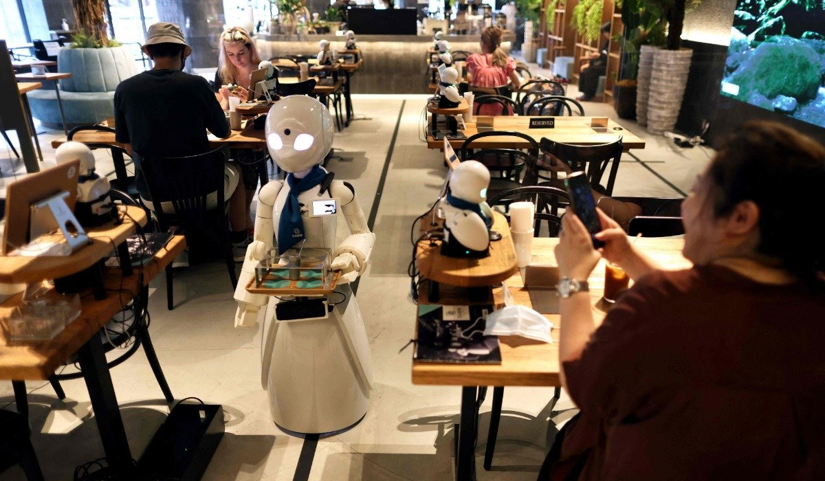 Tokyo robot cafe offers job opportunities for people with disabilites